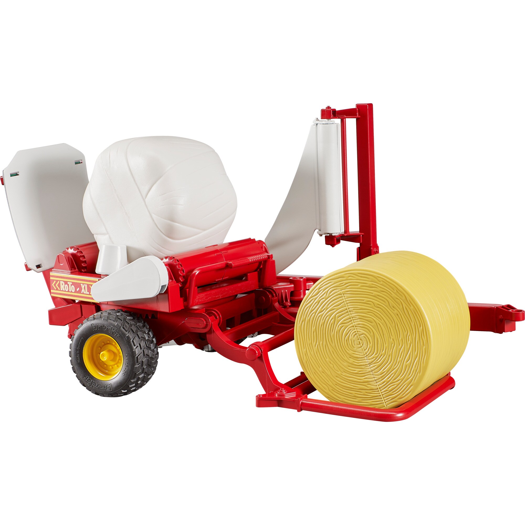 bruder Modellfahrzeug Ballenwickler mit ockerbraunem und schwarzem Rundballen - Bild 1