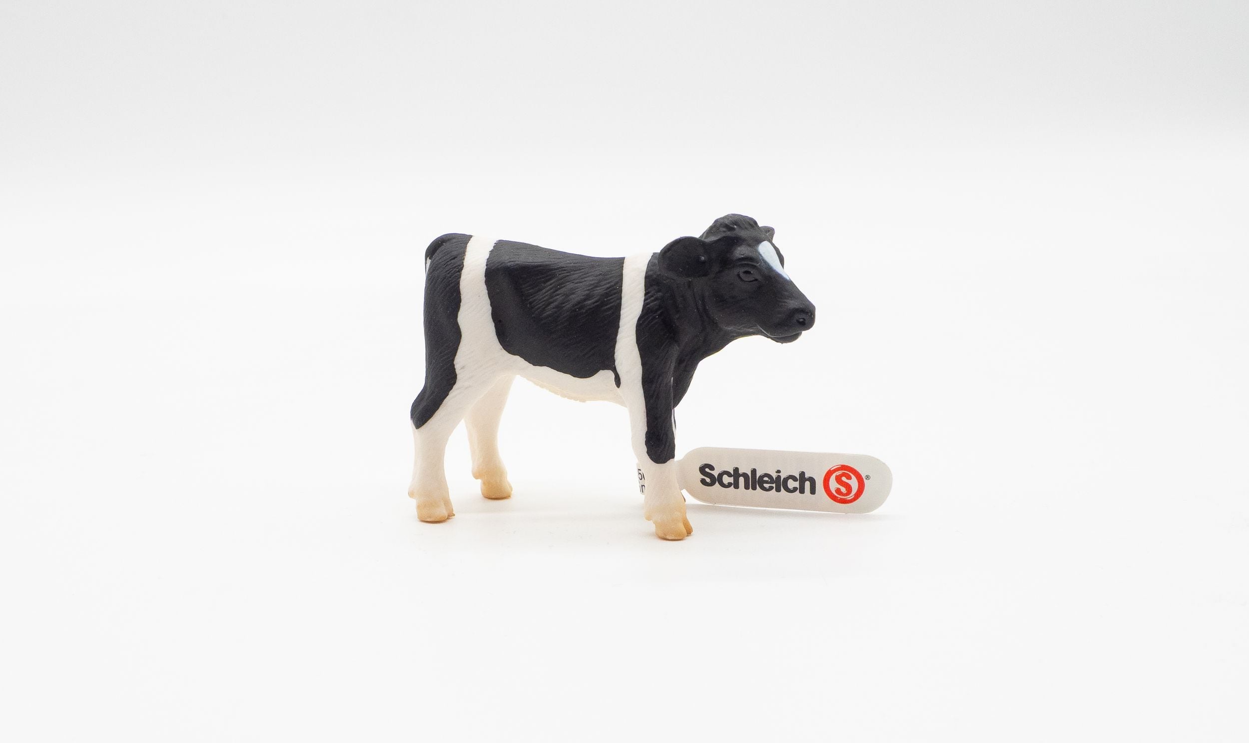 Schleich 13139 Kalb schwarzbunt - Bild 1