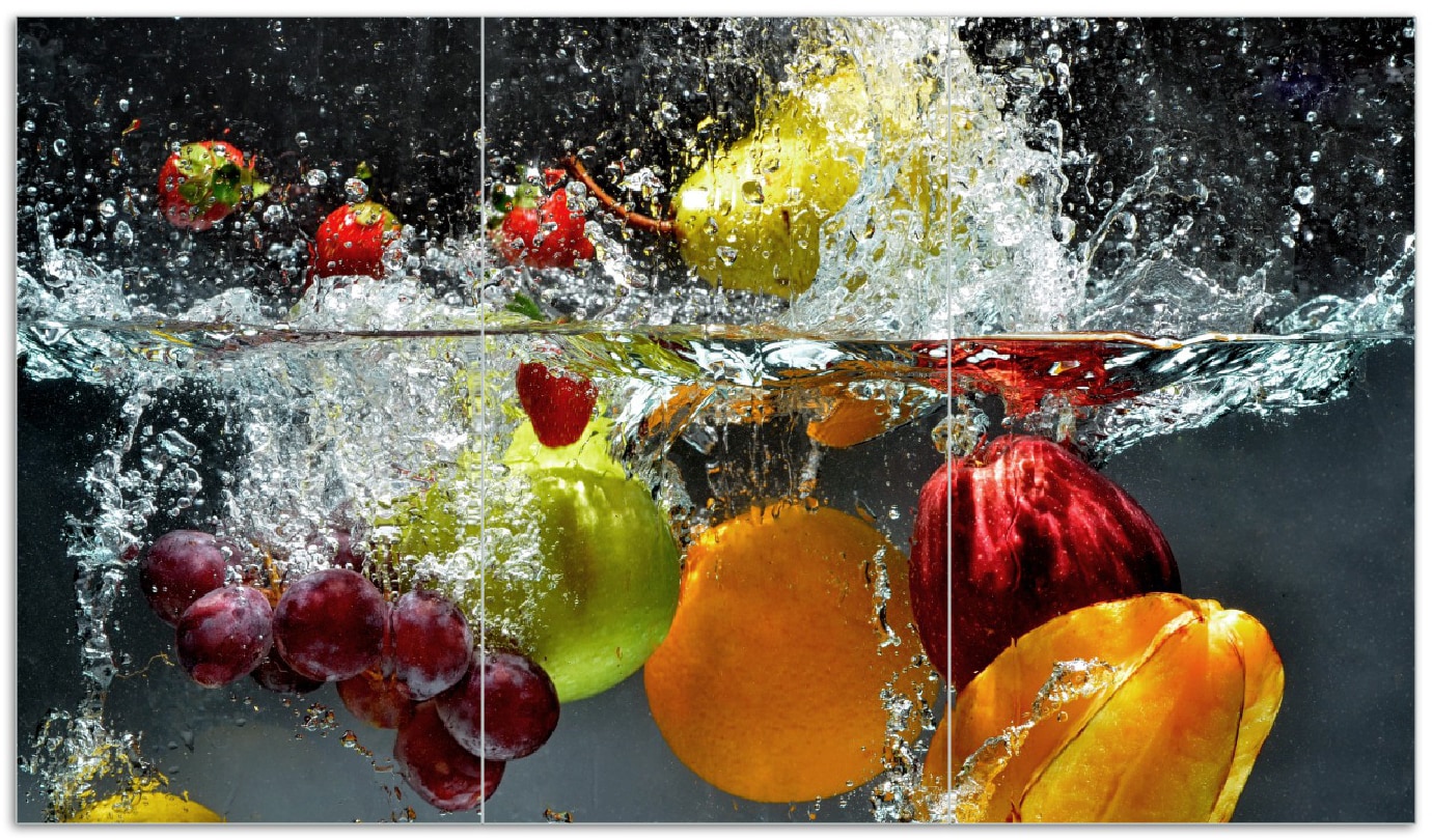Wallario Herdabdeckplatte 80 x 52 cm (BxH), 1-teilig Fr&uuml;chte im und unter Wasser - Splashing Fruits - Bild 1