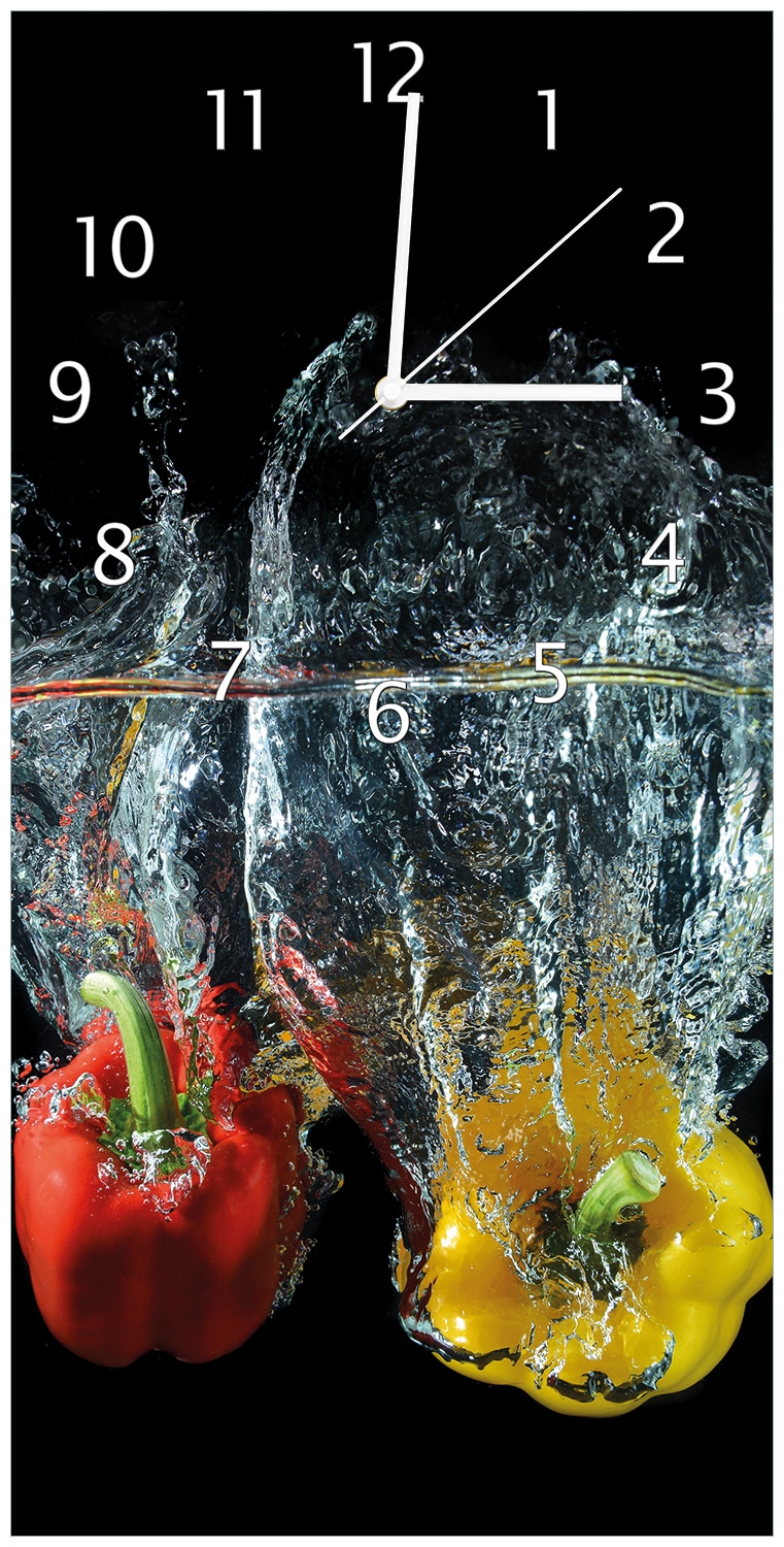 Wallario Uhr 30 x 60 cm, wei&szlig;e Zeiger Paprika-Mix - frische Paprika in rot, gelb und gr&uuml;n im Wasser - Bild 1